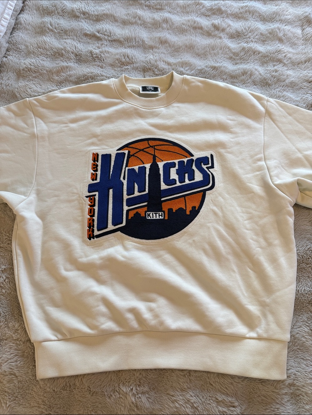Kith Cream Crewneck with Blue & Orange Knicks Patch
